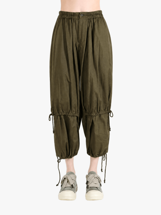 Green pants, full body view