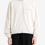 Tan jacket, full body view