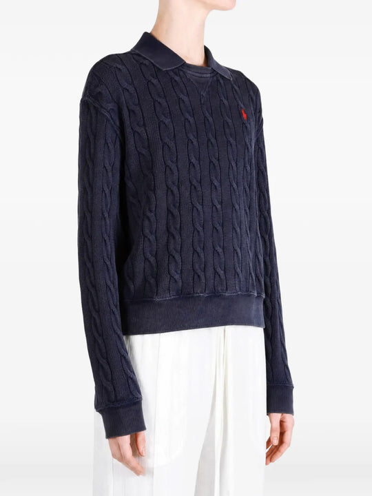 Navy shirt worn by a person, showing the shirt fit