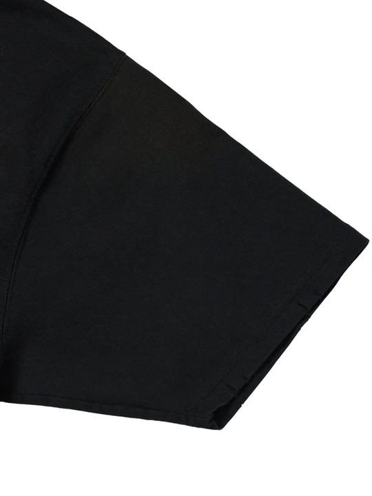 Close up of Black t-shirt,showing texture of the cotton fabric