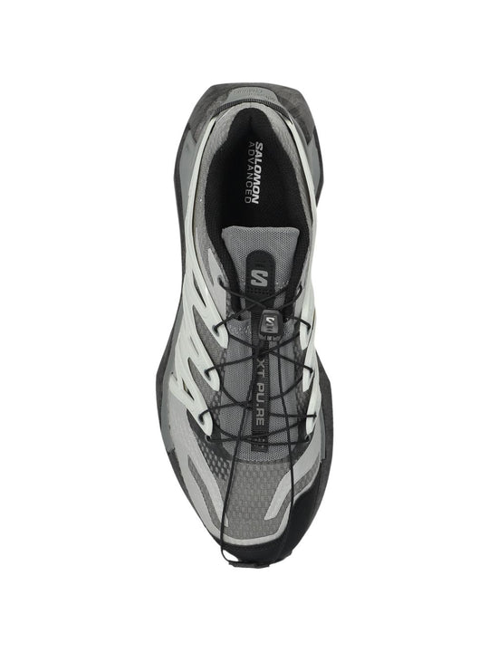 Grey sneakers, side view