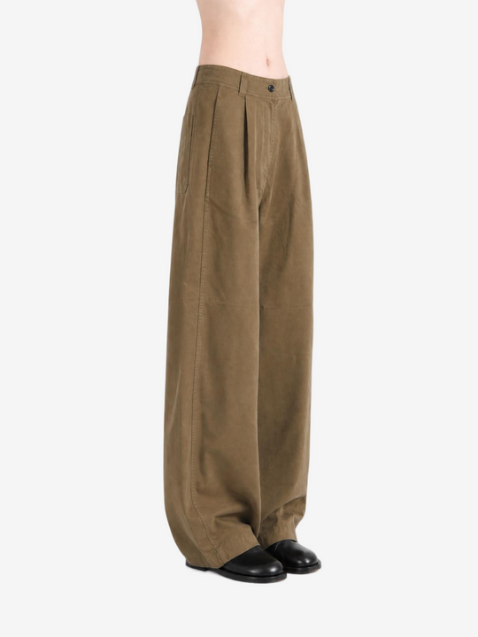 Brown pants worn by a person, showing the pants fit