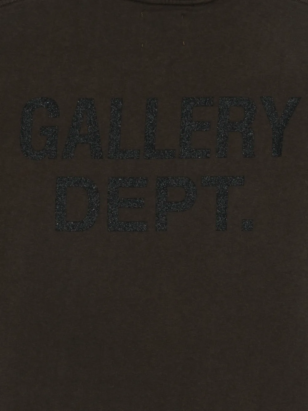 Close up of Black t-shirt, showing texture of the 100% cotton fabric