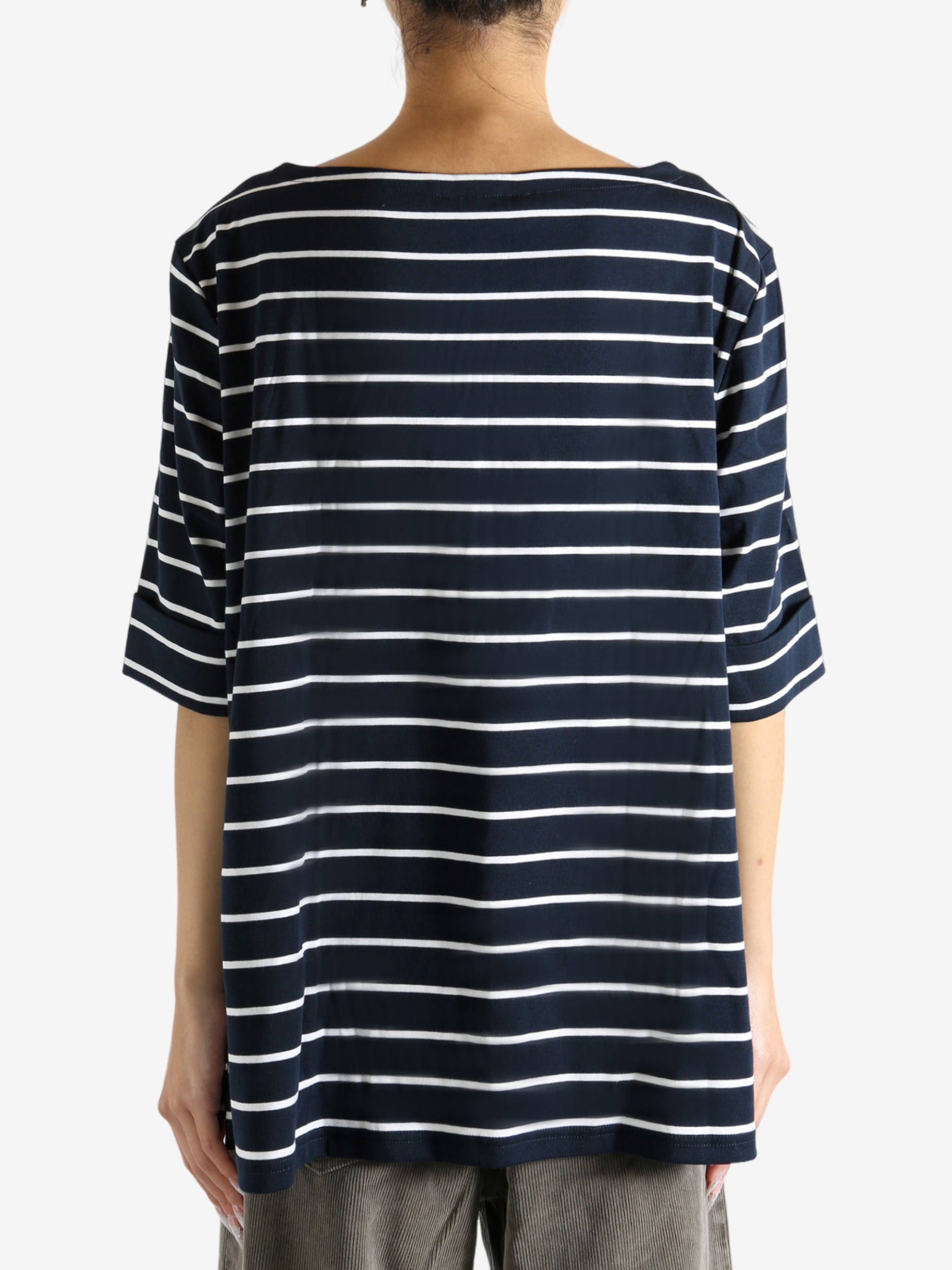 Navy top worn by a person, showing the top's fit