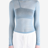 Blue top worn by a person, showing the top fit