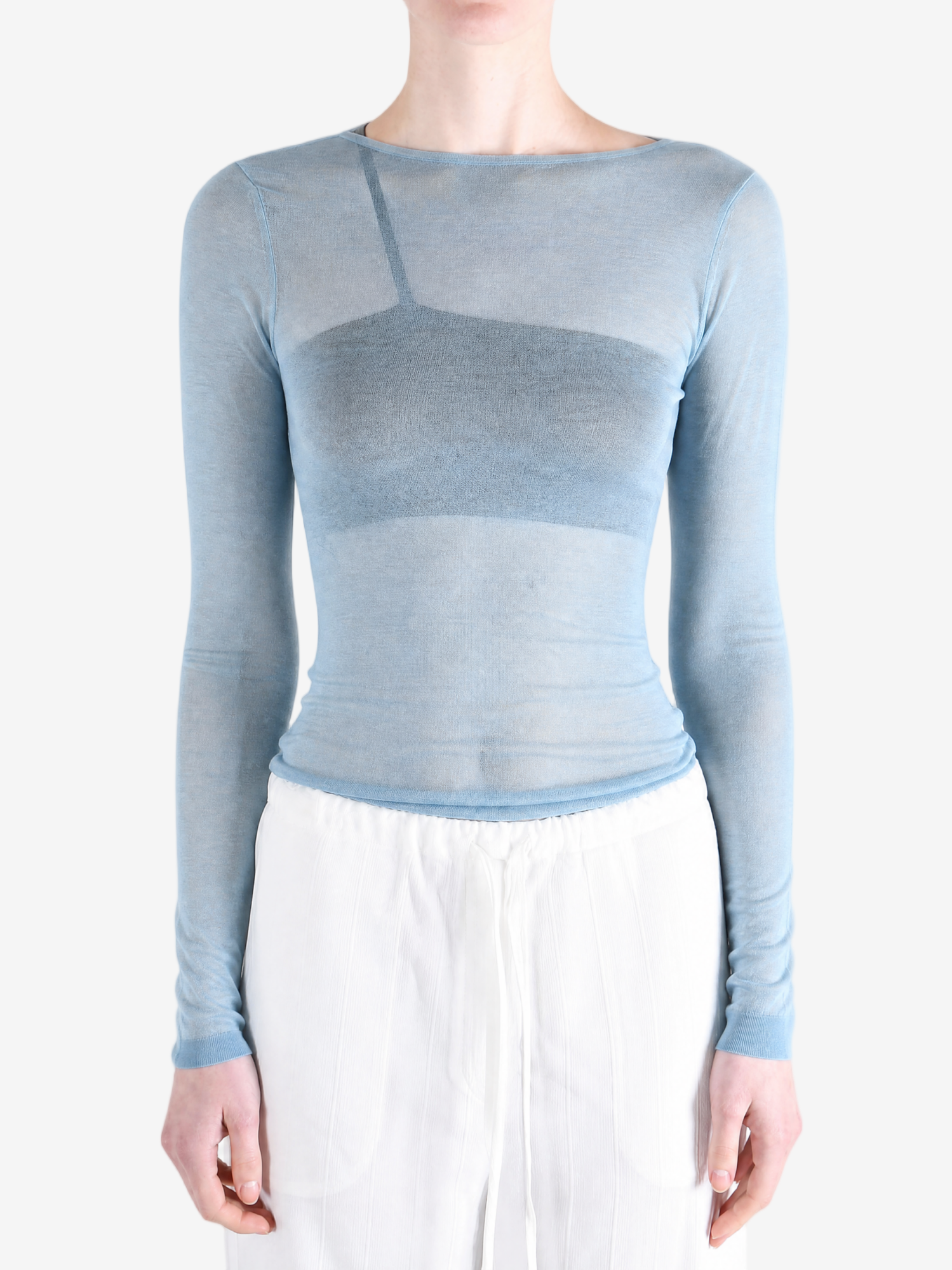 Blue top worn by a person, showing the top fit