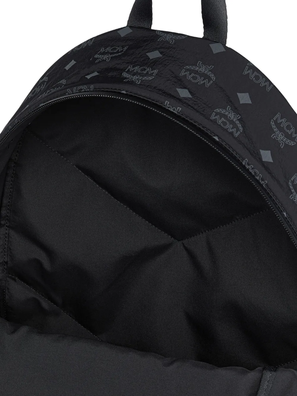 Black backpack with a quilted design and visible brand logo on a white background