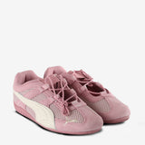 Pink sneakers, side view