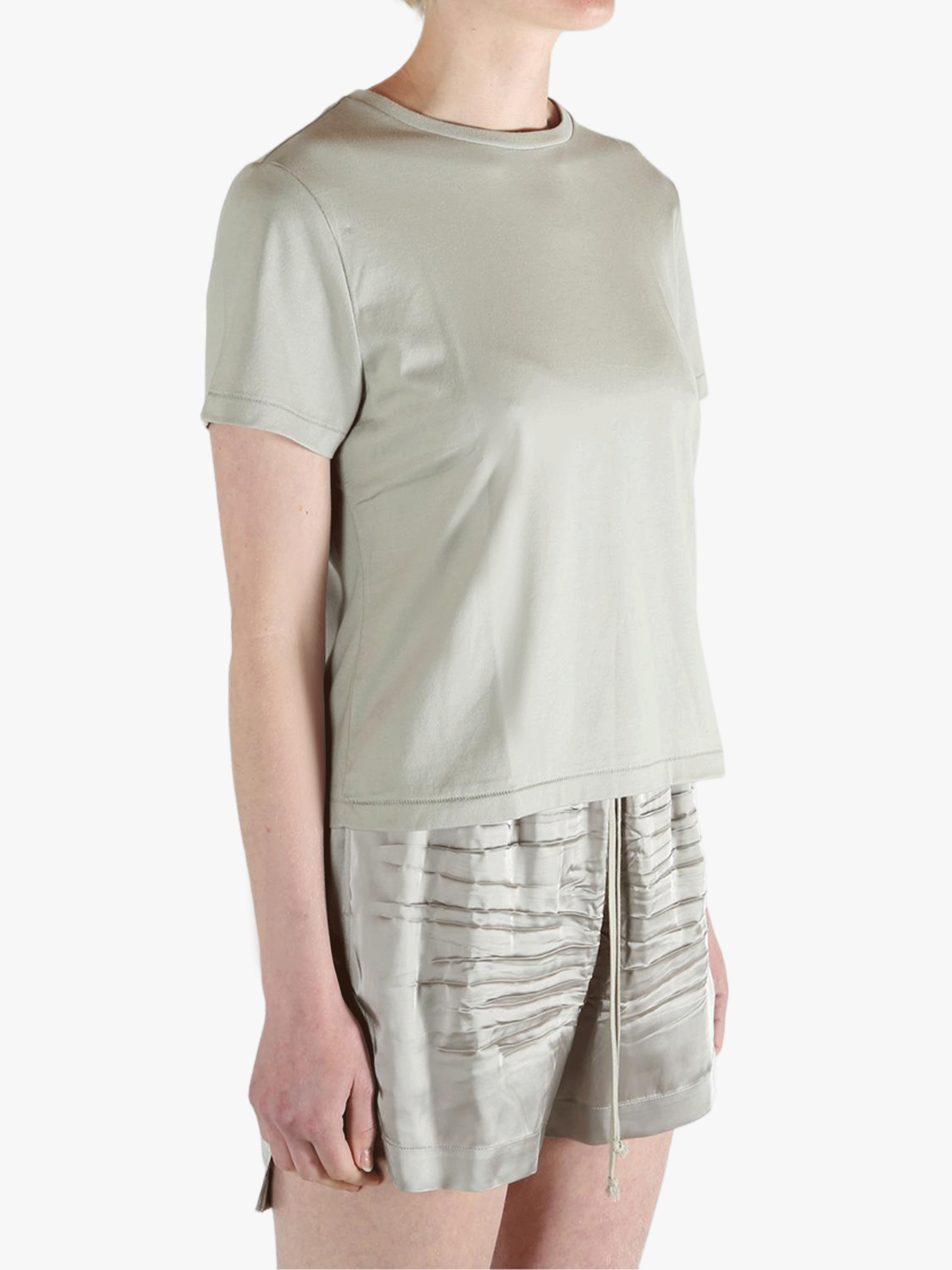 Grey t-shirt worn by a person, showing the shirt's fit