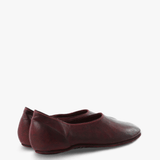 Burgundy shoes, side view