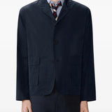 Navy jacket worn by a person, showing the jacket fit