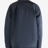 Navy jacket worn by a person, showing the jacket's fit