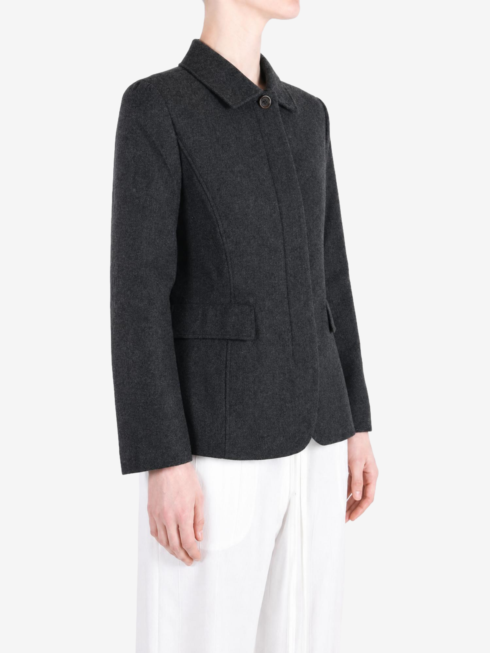 Grey jacket worn by a person, showing the jacket fit