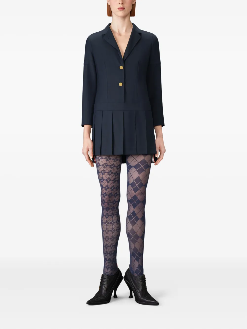 navy dress worn by a person, showing the dress fit