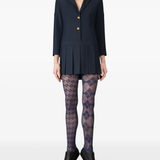 navy dress worn by a person, showing the dress fit