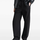 Black sneakers, full body view