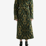 Green coat worn by a person, showing the coat's fit