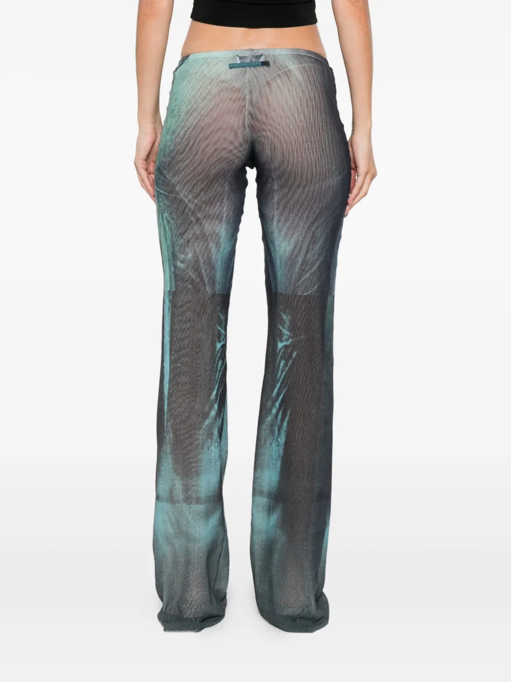 Blue pants worn by a person, showing the pants's fit