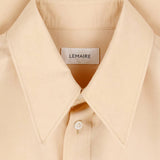 Close up of Tan shirt, showing texture of the 100% silk fabric
