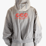 Grey hoodie, worn by a person, showing the hoodies fit