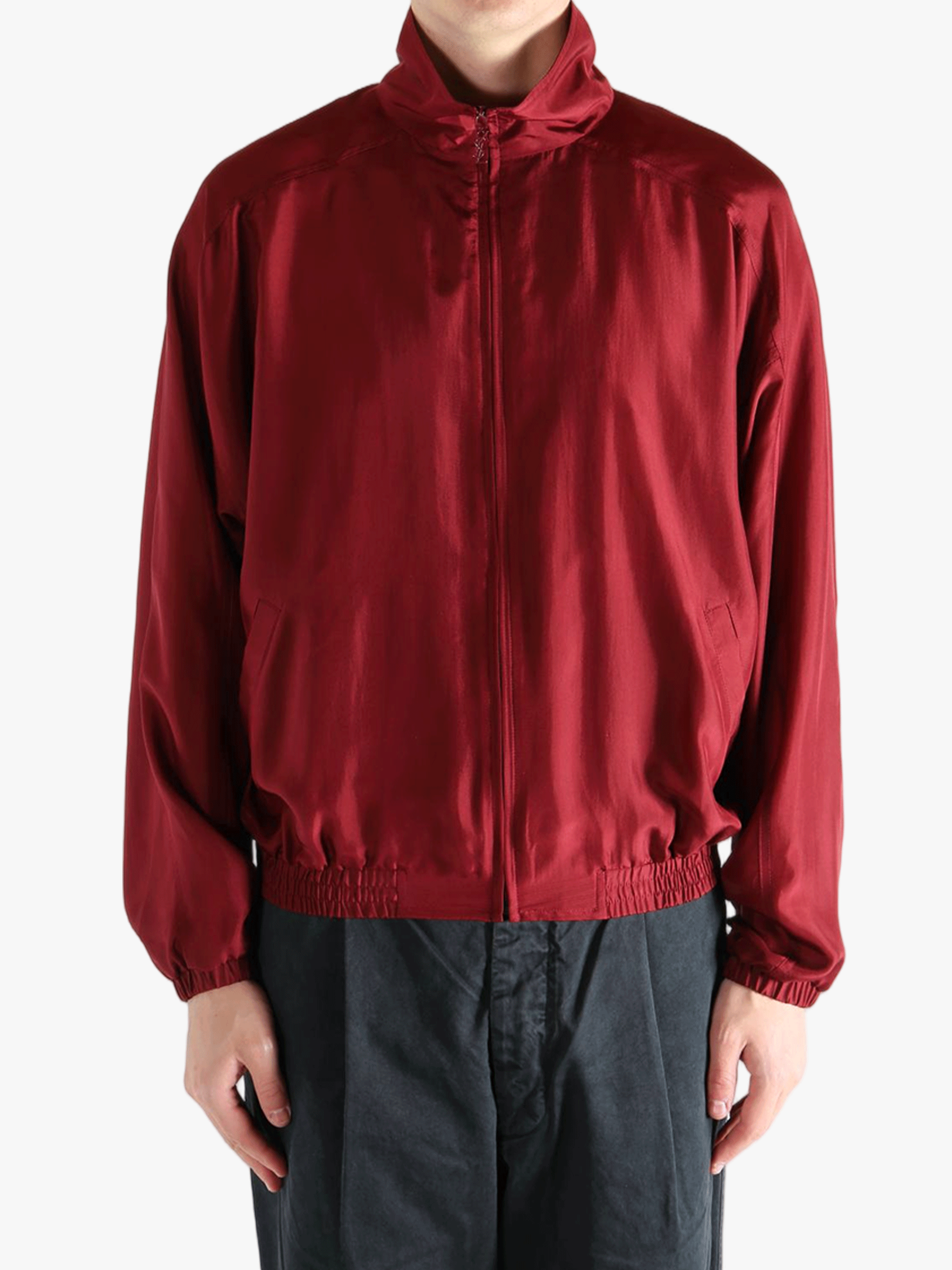 Red jackets worn by a person, showing the jackets fit