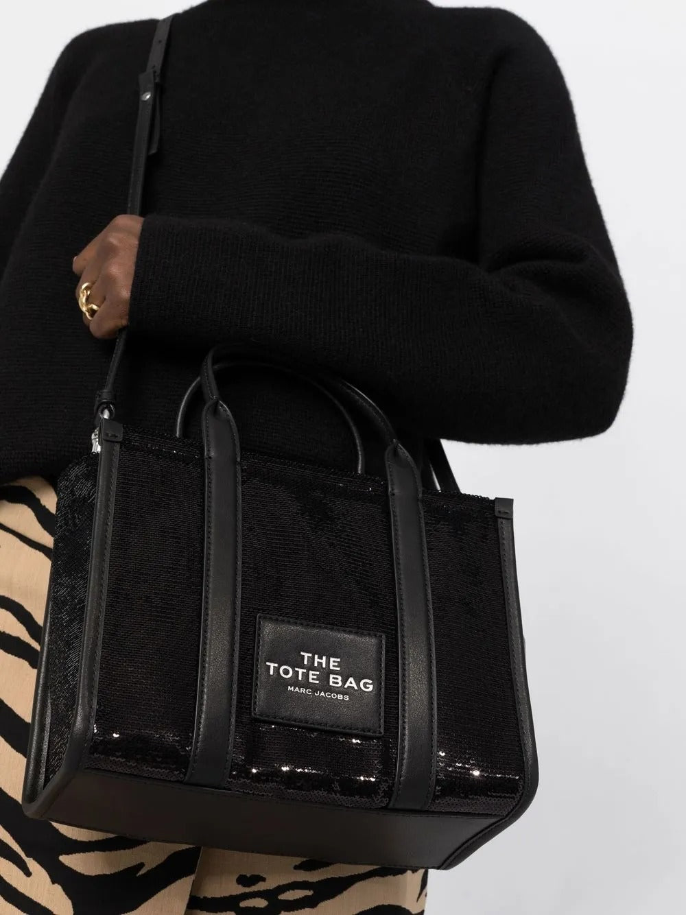 Black bag worn by a person, showing the bag's fit