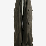 Brown pants worn by a person, showing the pants's fit