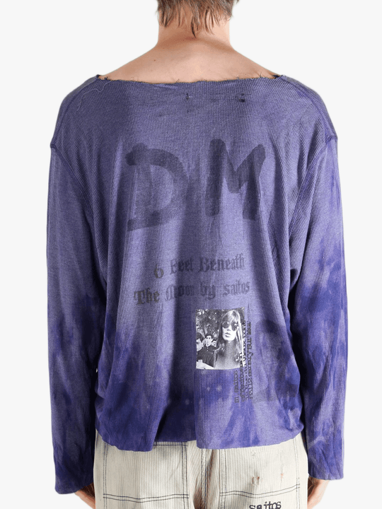 Purple top worn by a person, showing the tops fit
