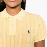 close up of yellow shirt, showing texture of the cotton fabric
