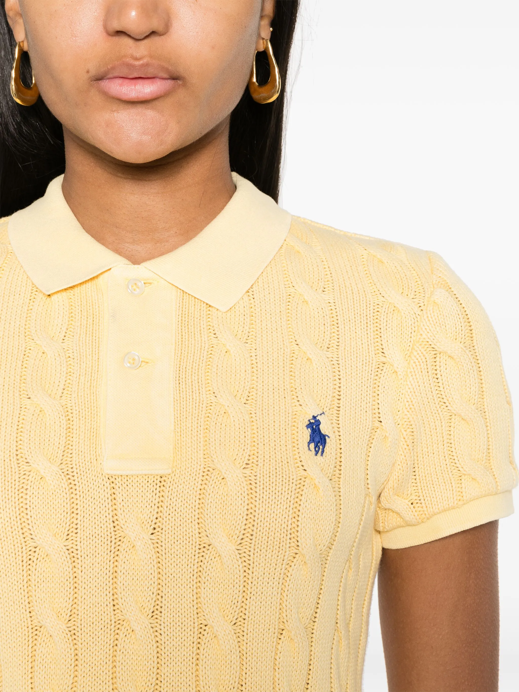 close up of yellow shirt, showing texture of the cotton fabric
