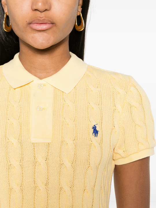 close up of yellow shirt, showing texture of the cotton fabric
