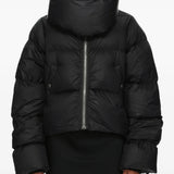 Black jacket worn by a person, showing the jacket fit