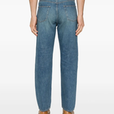 Blue pants worn by a person, showing the pants' fit