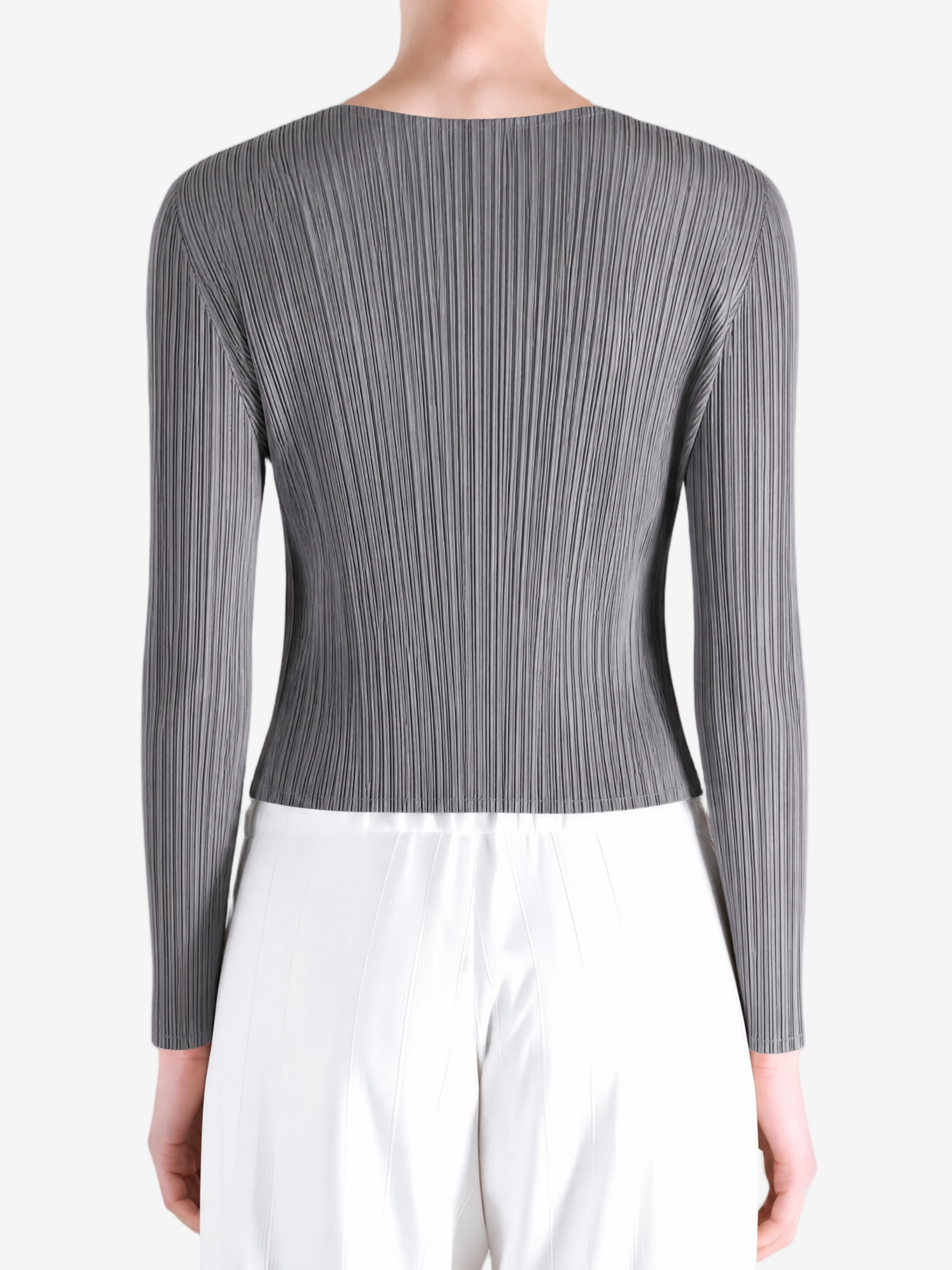 Grey knitwear worn by a person, showing the knitwear fit