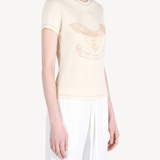 Tan t-shirt worn by a person, showing the t-shirt fit