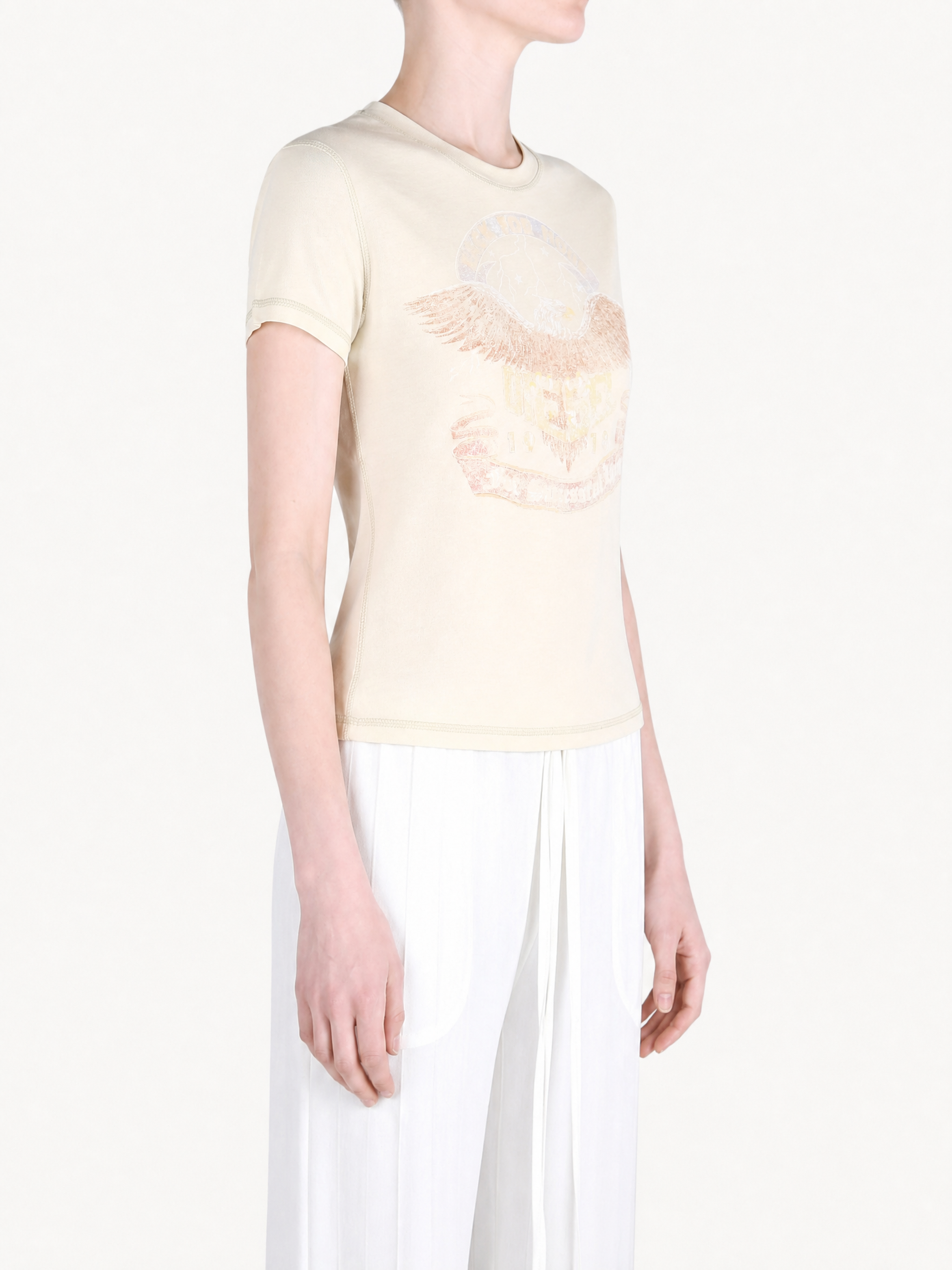 Tan t-shirt worn by a person, showing the t-shirt fit