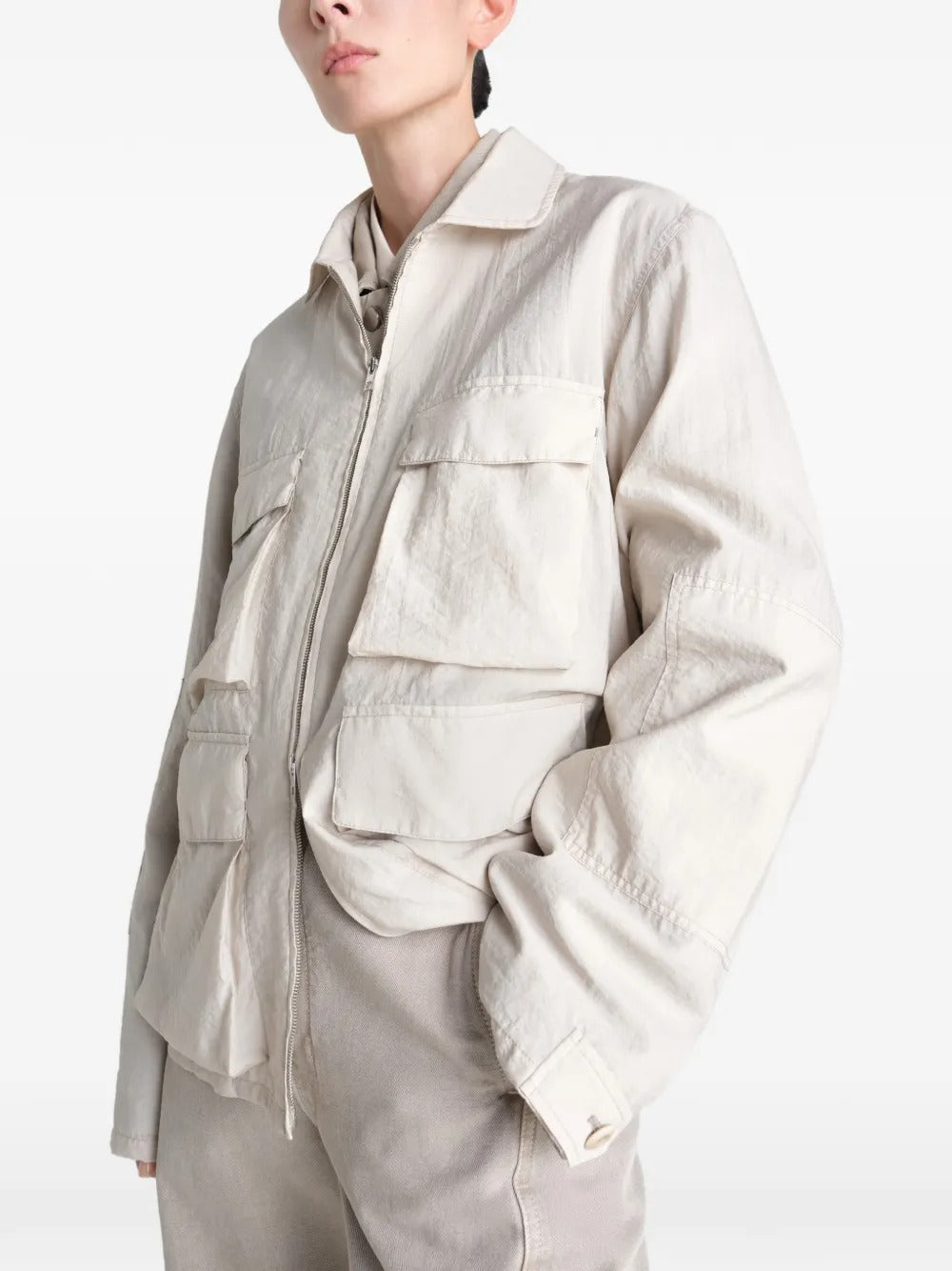 White jacket worn by a person, showing the jacket's fit
