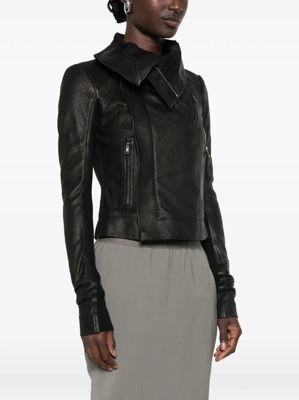 Black jacket worn by a person, showing the jacket fit