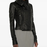 Black jacket worn by a person, showing the jacket fit