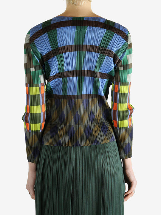 Blue top worn by a person, showing the top's fit