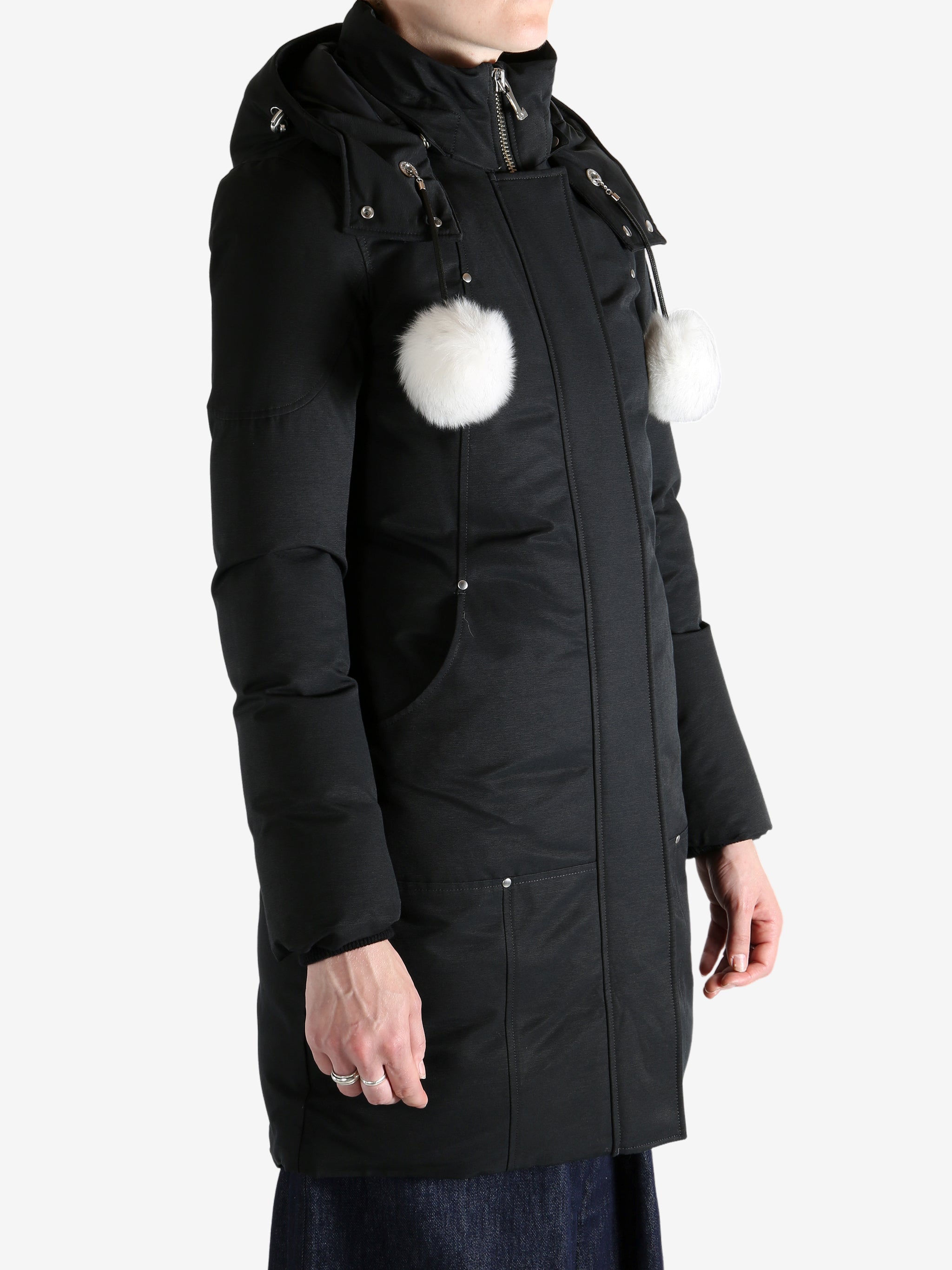 Black jacket worn by a person, showing the jacket fit