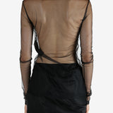 Black t-shirt worn by a person, showing the t-shirt's fit