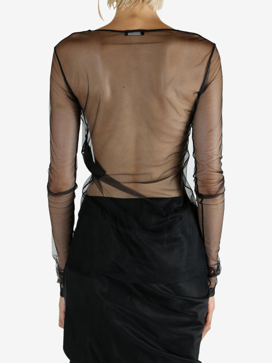 Black t-shirt worn by a person, showing the t-shirt's fit