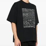 Black t-shirt worn by a person, showing the shirt's fit