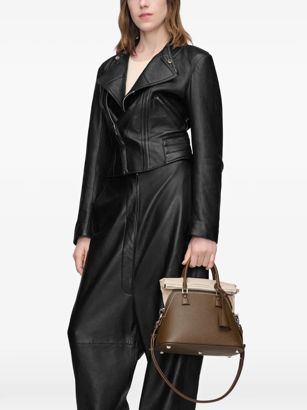 Brown bag worn by a person, showing the bag's fit