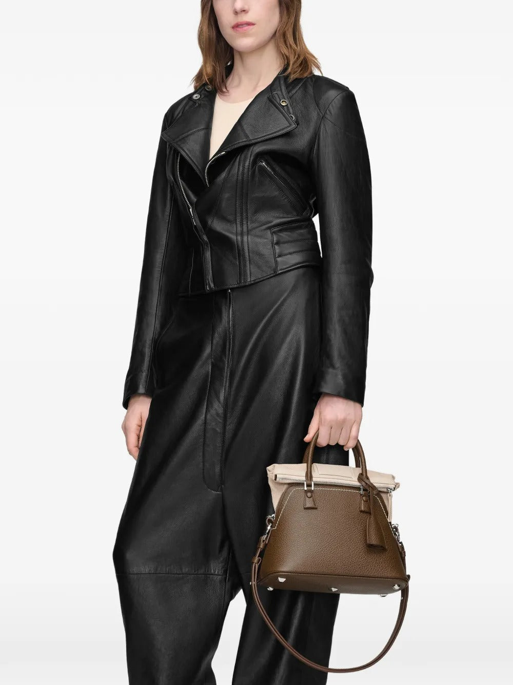 Brown bag worn by a person, showing the bag's fit