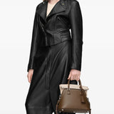 Brown bag worn by a person, showing the bag's fit