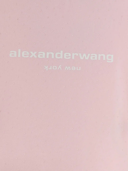 Close up pink t-shirt, showing texture of the cotton fabric