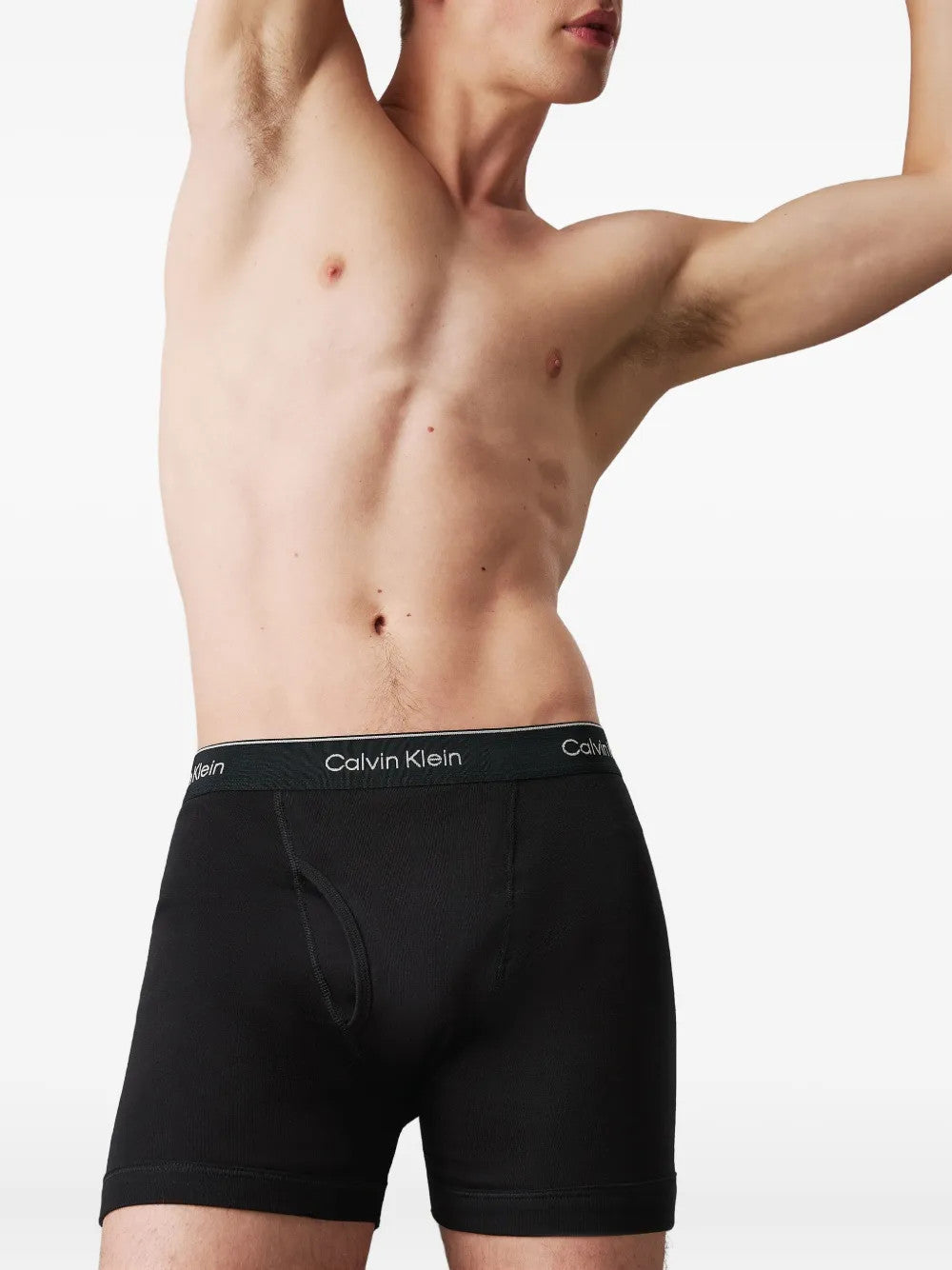 Black shorts worn by a person, showing the shorts fit