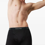 Black shorts worn by a person, showing the shorts fit
